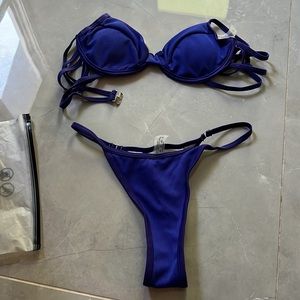 BRAND new. Never worn. Tried on and it was too large